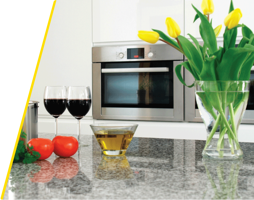 kitchen counter with vase of flowers